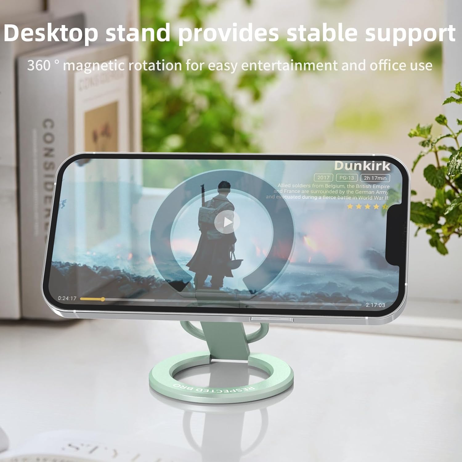 Phone on a green desk stand with text about stable support and magnetic rotation.