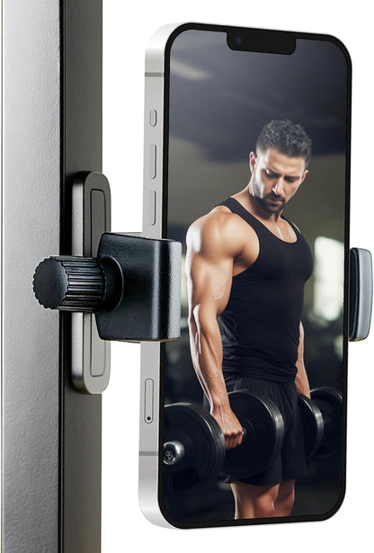 Phone holder with smartphone displaying a fitness app showing a man lifting weights.